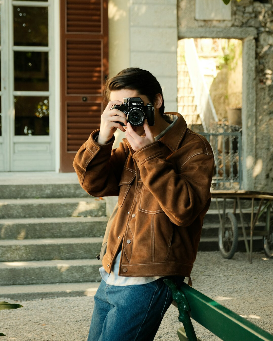 Portrait of a man camera operator in a casual jacket