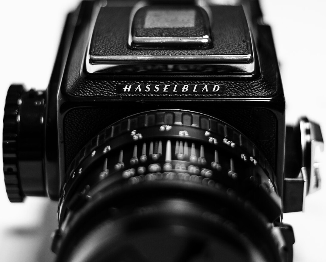 Close-up of a professional broadcast camera lens and viewfinder